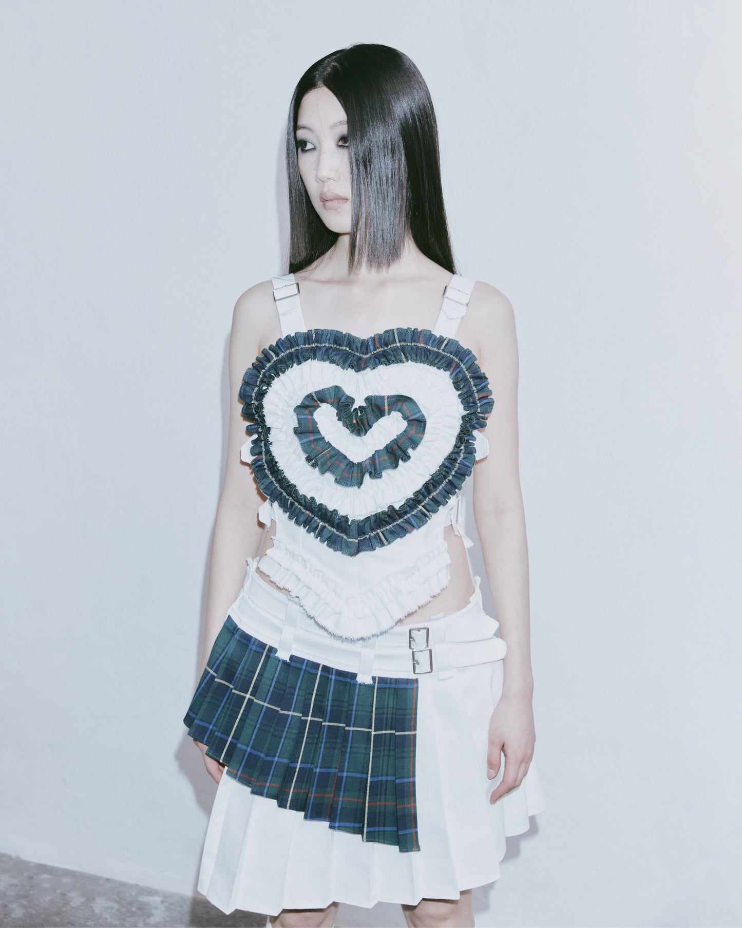 TWO-PIECE ASYMMETRICAL MINI SKIRT (G/W)