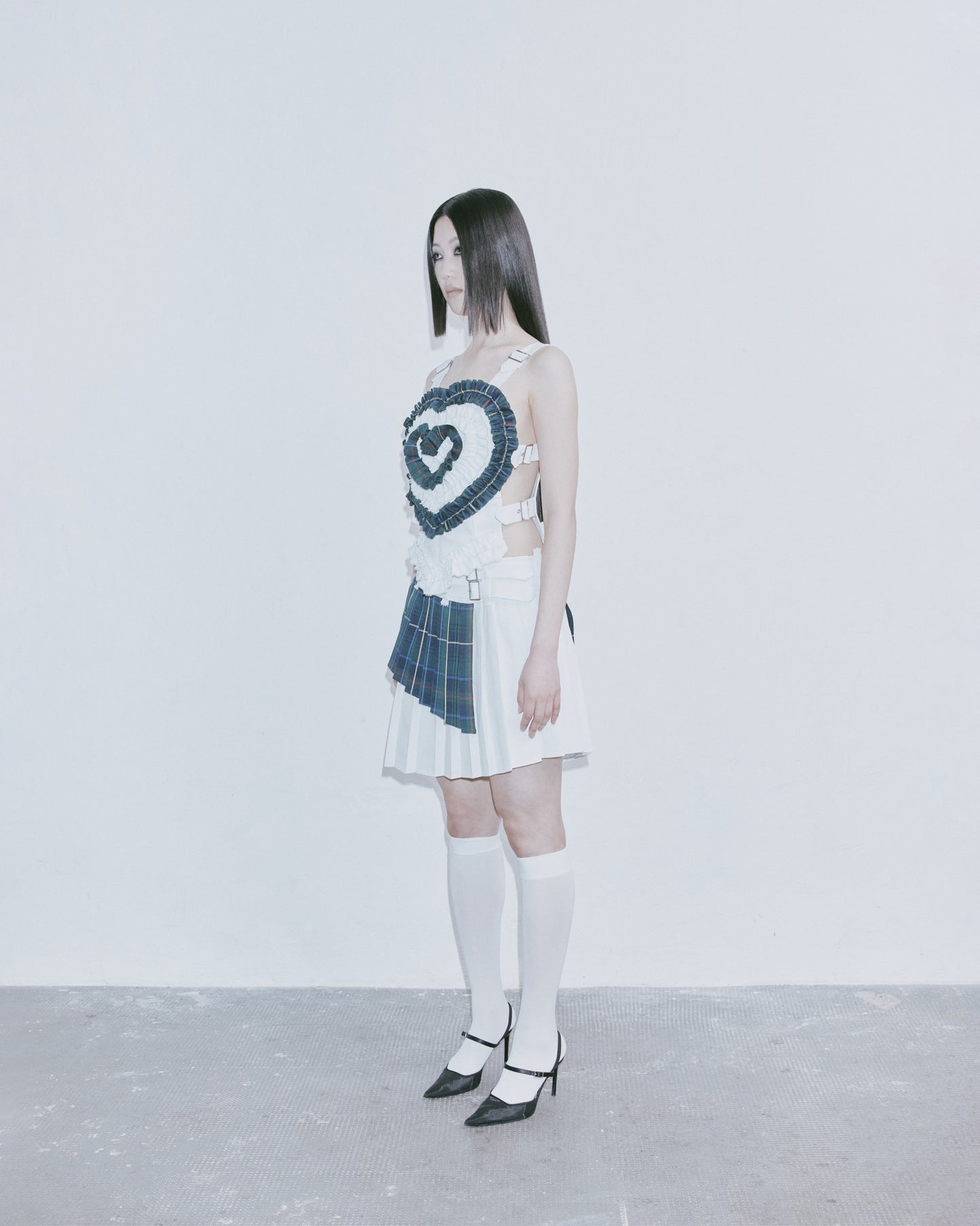 TWO-PIECE ASYMMETRICAL MINI SKIRT (G/W)