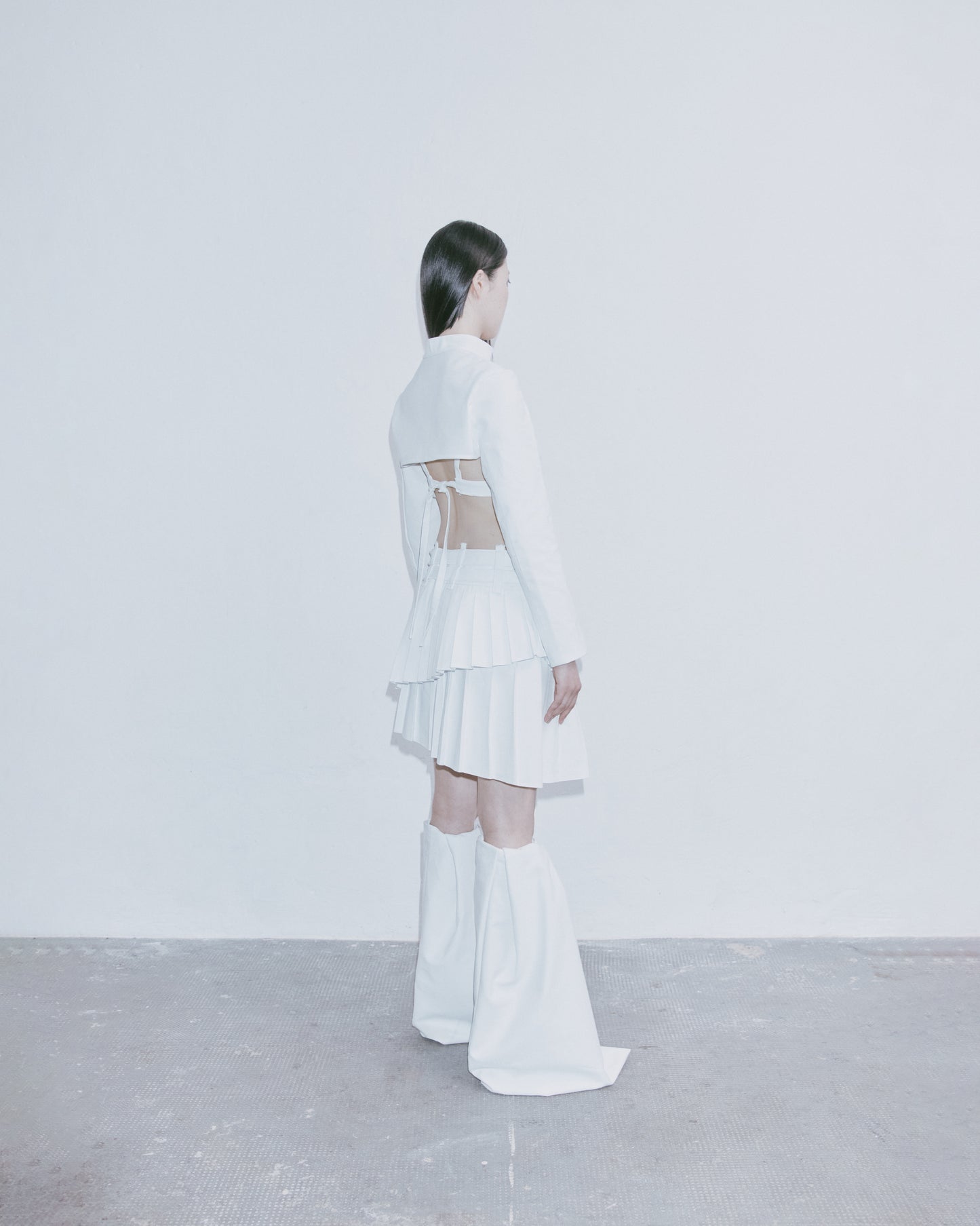 TWO-PIECE ASYMMETRICAL MINI SKIRT (W)